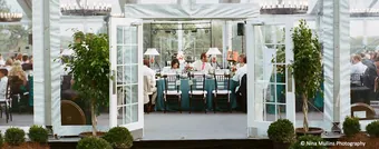 The entrance to a tented wedding reception