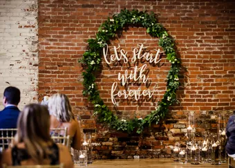 A floral ceremony backdrop built for a wedding